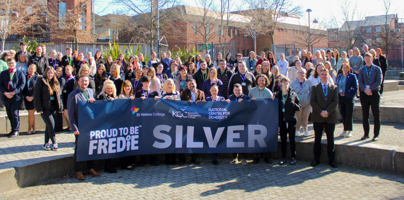 Picture of our staff and students celebrating achieving Silver accreditation