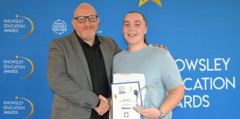 Picture of our student Kiera getting her award