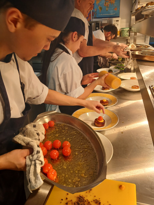 Picture of our students working in the kitchen