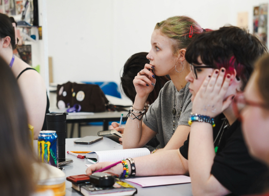 Students listening to Tobias