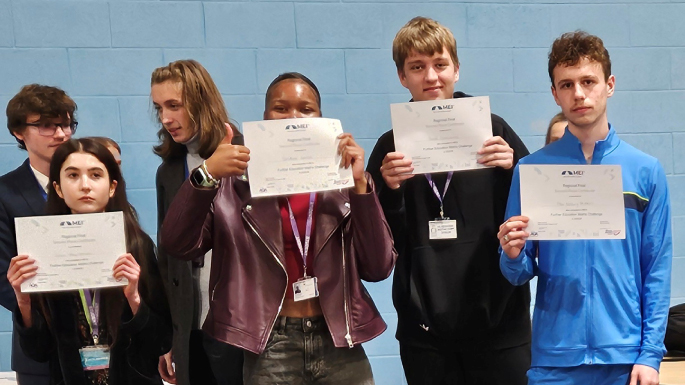 Picture of our students at the EMI Competition with their certificates