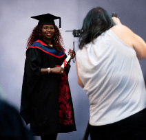 Someone getting their photograph taken at our graduation ceremony